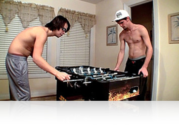 Monday, January 1st: Straight stud guy Nolan is confident about his skills at playing Foosball, so when gay emo boy Jay challenges him to a "looser sucks winner's cock" game of "strip Foosball"; Nolan quickly accepts! In an almost even, play by play stripping match, Nolan becomes a little concern, but in the final, he scores the winning point and Jay falls to his knees to service Nolan's massive and horny cock. With expert precision, Jay tongues and sucks Nolan's straight, big dick and fondles his cum fill balls. Our cameras close in on the emo boys cock as pre-cum surfaces from excitement. After sucking and enjoying Nolan's naked lean body, Jay leans back and jerks off his hard cock, showering his belly in his own jizz before Nolan launches his cum on the boys awaiting face. This game seems to have no losers as both guys seem happy and content as the cum drips from their satisfied cocks.